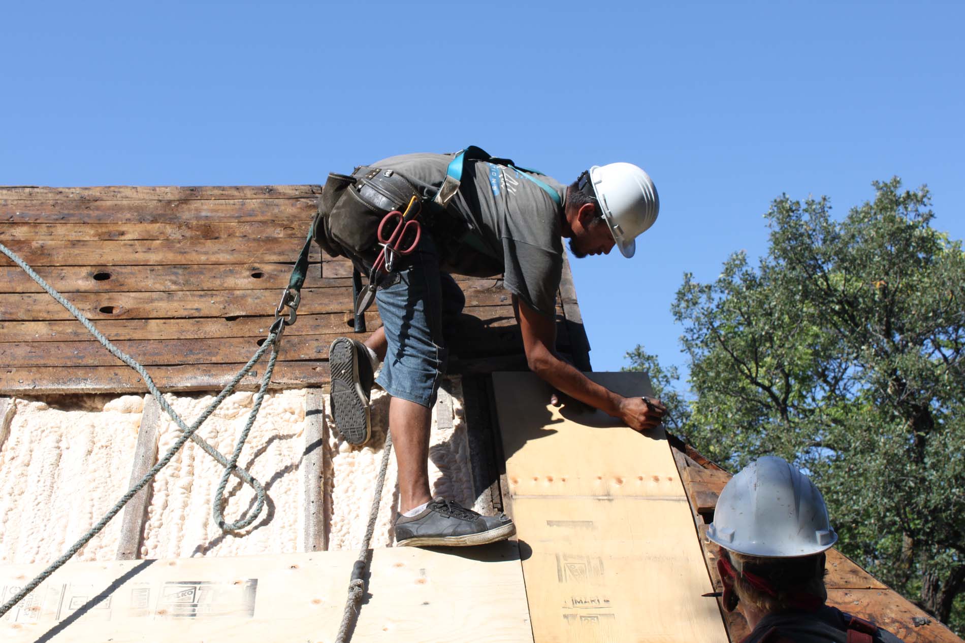 Above All crew at work on an attic insulation project